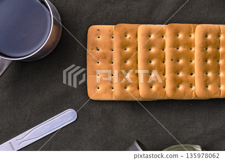Hardtack and emergency food on a cloth 135978062