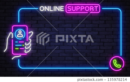 Neon online support sign with smartphone and call icon on brick background. Bright colors highlight customer service, help desk, and communication themes. 135978214