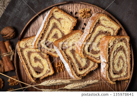 Sliced of walnut roll Sliced of walnut roll 135978641