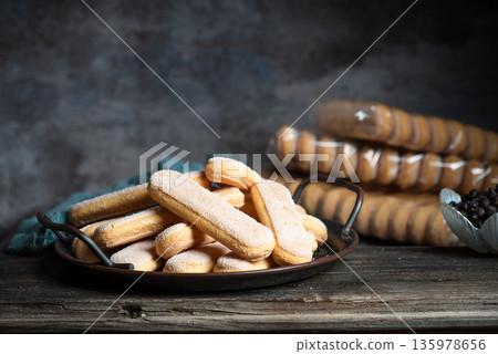 Italian sponges fingers. Italian sweet biscuit Italian sponges fingers. Italian sweet biscuit 135978656