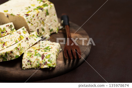 Sliced tahini pistachio halva Sliced tahini pistachio halva 135978674