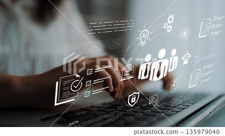 Hands typing on a laptop with digital interface displaying technology symbols, data charts, and security icons representing modern digital interaction and communication Gluon 135979040