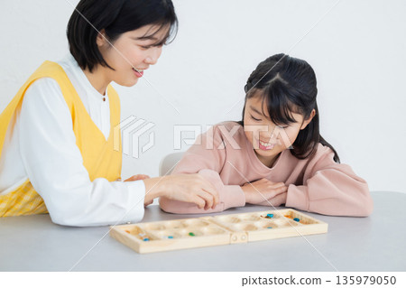 Elementary school students playing games at school 135979050