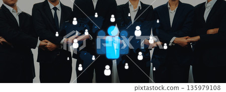 Professional business team standing together with digital network icons symbolizing connection, collaboration, and communication in corporate environment Trope 135979108