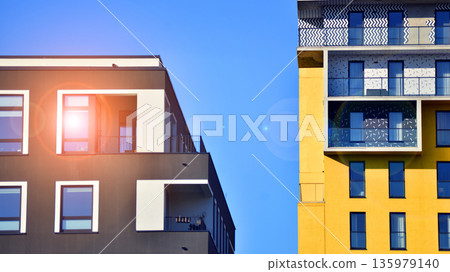 Luxury house complex of flats in condo area. Part of city real estate property, condo architecture on a sunny day no people. Luxury house complex of flats in condo area. Part of city real estate property, condo architecture on a sunny day no people. 135979140