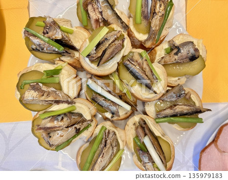 juicy fresh sandwiches with sprats and herbs 135979183