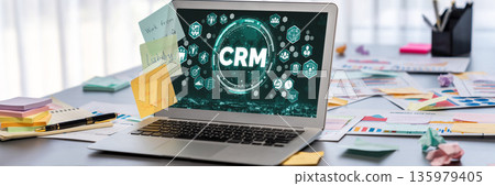 Sticky note for creative and analytic brainstorm with BI data on laptop. Prodigy 135979405