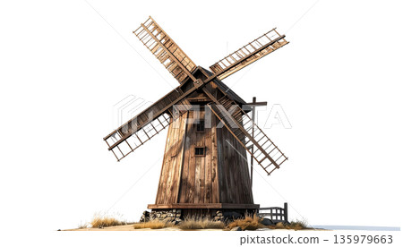 An old wooden windmill is abandoned on a grassy hill in the countryside against a white background. An old wooden windmill is abandoned on a grassy hill in the countryside against a white background. 135979663