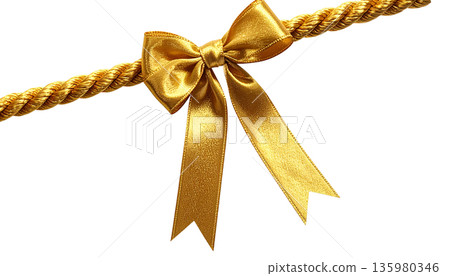 A shimmering gold ribbon is tied in a bow and placed against a white background. A shimmering gold ribbon is tied in a bow and placed against a white background. 135980346