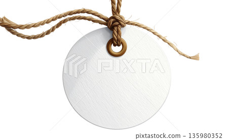 A blank price tag on a string against a white background. 135980352
