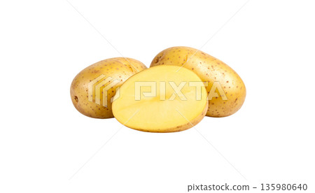 A large pile of fresh, organic potatoes is placed on a white background. A large pile of fresh, organic potatoes is placed on a white background. 135980640