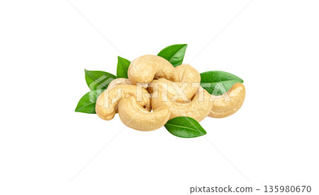 Fresh, raw cashew nuts on a white background. Fresh, raw cashew nuts on a white background. 135980670