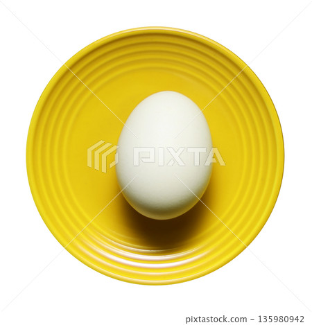 Eggs and a small plate 135980942