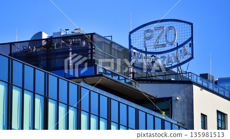 Warsaw, Poland. 6 November 2025. Urban landscape. Sign with company name: PZO Warszawa. Warsaw, Poland. 6 November 2025. Urban landscape. Sign with company name: PZO Warszawa. 135981513