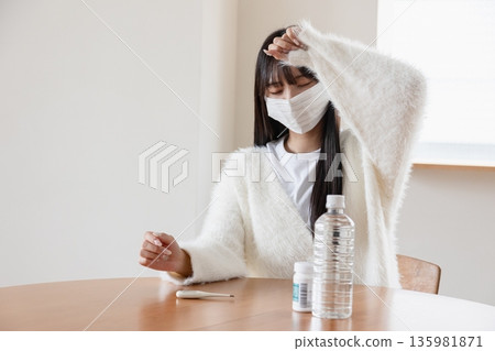 A woman with poor health 135981871
