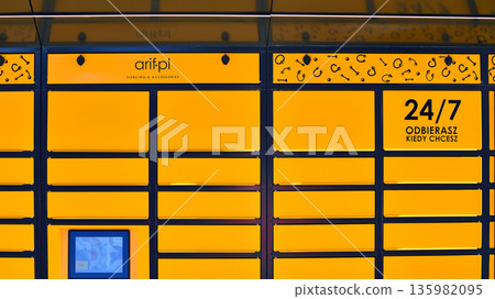 Warsaw, Poland. 6 November 2025. Package collection machine, delivery service. Smart electronic steel parcel locker box. arif-pl parcel machine with logo sign. 135982095