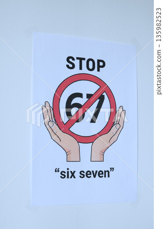 Sign on the white wall prohibition meme phrase six seven 135982523