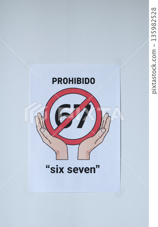 Sign on the white wall prohibition meme phrase six seven in Spanish Sign on the white wall prohibition meme phrase six seven in Spanish 135982528
