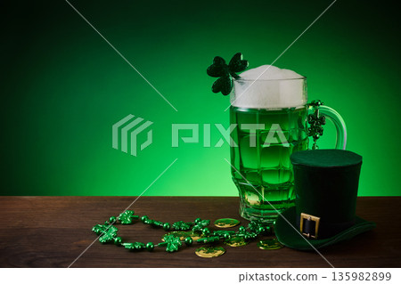 St. Patrick's day green beer celebration with shamrock and hat 135982899