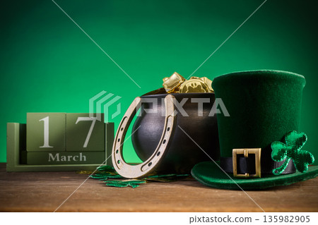 St. Patrick's day celebration with leprechaun hat and pot of gold 135982905