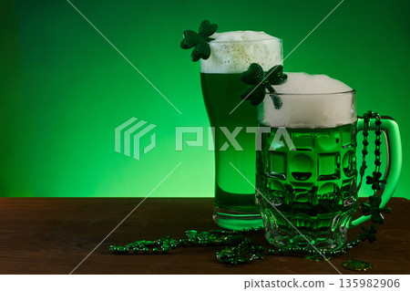 Green beer celebrating st patrick's day with shamrocks 135982906