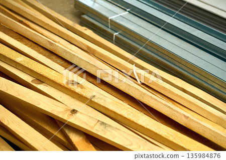 Wooden stacked timber beams for construction and repair Wooden stacked timber beams for construction and repair 135984876