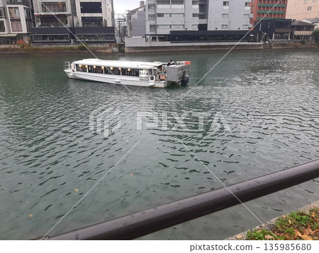 Tourist boat going on the river 135985680