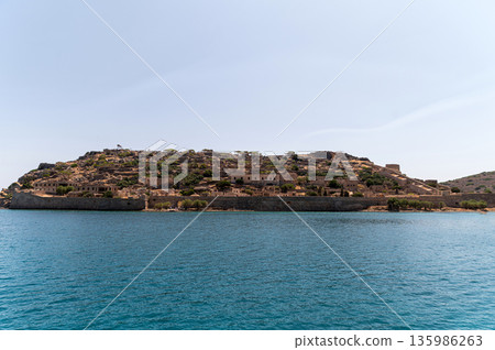 Exploring the historical site of Spinalonga in Crete, Greece during a sunny day 135986263