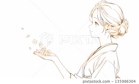 身穿和服的女子手捧一朵花 135986304