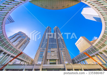 Tokyo cityscape in Japan, with a view of the Tokyo Metropolitan Government Building and sunlight... a ray of hope for a new era... = January 25, 2026 135986467