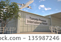Toronto Pearson International Airport entrance sign and airplane passing above on a summer day, Toronto, Canada 3D rendering 135987246