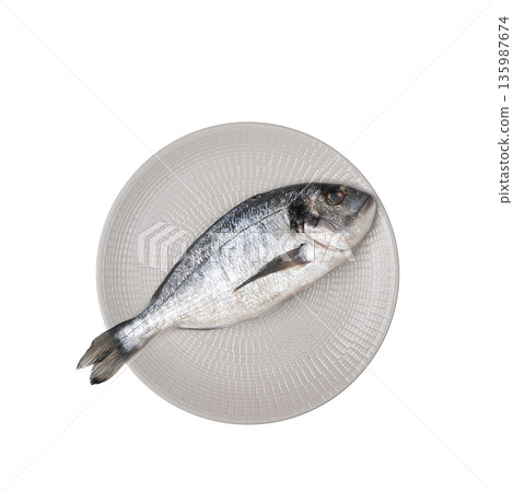 a sea bream on a plate 135987674