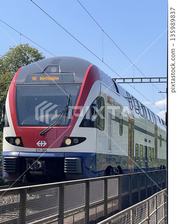 Swiss double decker train traveling through gebenstorf 135989837