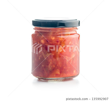 Fermented cabbage. Kimchi. Korean food in jar isolated on white background. Fermented cabbage. Kimchi. Korean food in jar isolated on white background. 135992907