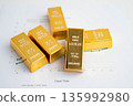 Gold bar on graph, economy finance exchange trade investment. 135992980
