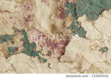 Textured Surface of Bleached Lime Paint with Sun-Peeled Layers in Pink and Green Tones 135993430