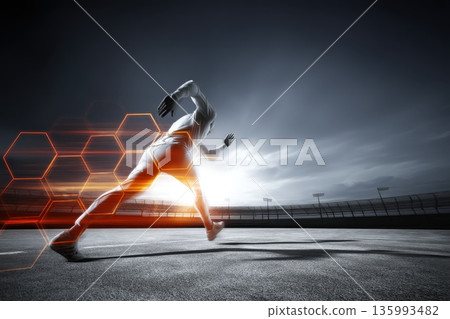Dramatic Finish Line Encounter of an Athlete in Motion Under Striking Lighting Conditions 135993482