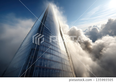 Bending Skyscrapers Morphing Like Liquid Against a Cloudy Blue Sky 135993505