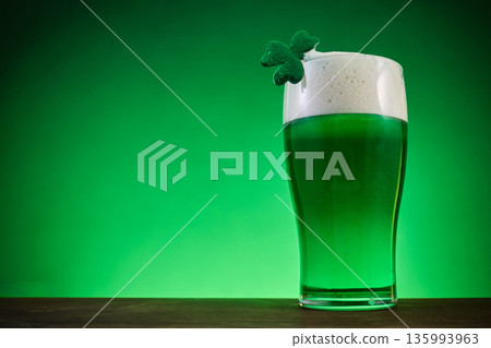 Green beer pint with shamrock for st. Patrick's day 135993963