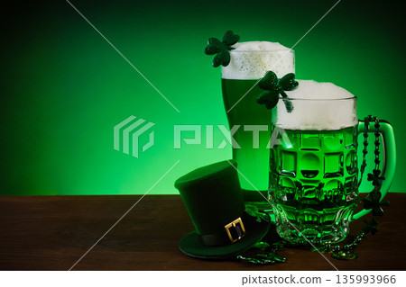 St. Patrick's day celebration with green beer and shamrock decor St. Patrick's day celebration with green beer and shamrock decor 135993966