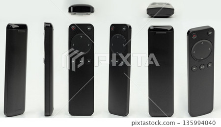 Black plastic remote control isolated Black plastic remote control isolated 135994040