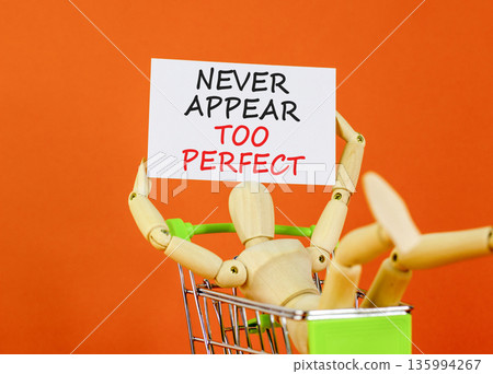 Never appear too perfect symbol. Concept words Never appear too perfect on beautiful white paper. Beautiful orange background. Businessman model. Business never appear too perfect concept. Copy space. Never appear too perfect symbol. Concept words Never appear too perfect on beautiful white paper. Beautiful orange background. Businessman model. Business never appear too perfect concept. Copy space. 135994267