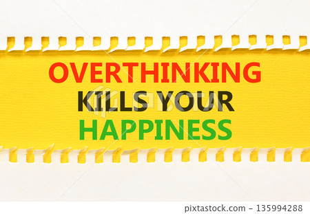 Overthinking kills your happiness symbol. Concept words Overthinking kills your happiness on yellow paper. Beautiful white paper background. Business overthinking kills happiness concept. Copy space. 135994288