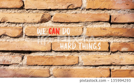 Support, help we can do hard things symbol. Concept words We can do hard things on beautiful brick wall. Beautiful brick wall background. Business we can do hard things concept. Copy space. 135994293