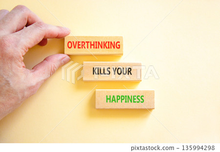 Overthinking kills your happiness symbol. Concept words Overthinking kills your happiness on wooden blocks. Beautiful white background. Business overthinking kills happiness concept. Copy space. 135994298
