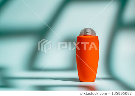 Sunscreen spf orange bottle Sunscreen spf orange bottle 135995092