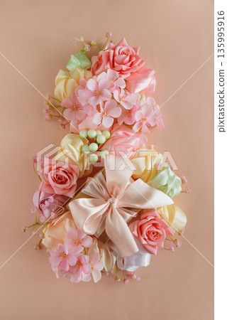 Floral Number Eight with Satin Bow. Elegant Womens Day Decoration on Pink Background 135995916