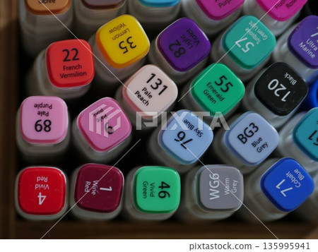 caps of multi-colored markers 135995941