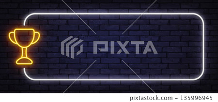 White neon frame with golden trophy icon on dark brick wall. Elegant glow represents victory, achievement, or award concept. 135996945