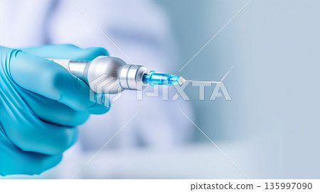 Dental tool is held by gloved hand in a clinic setting during treatment Dental tool is held by gloved hand in a clinic setting during treatment 135997090